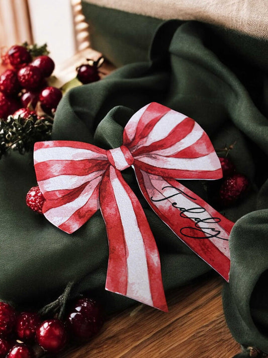 Candy cane bow place card for a christmas table setting